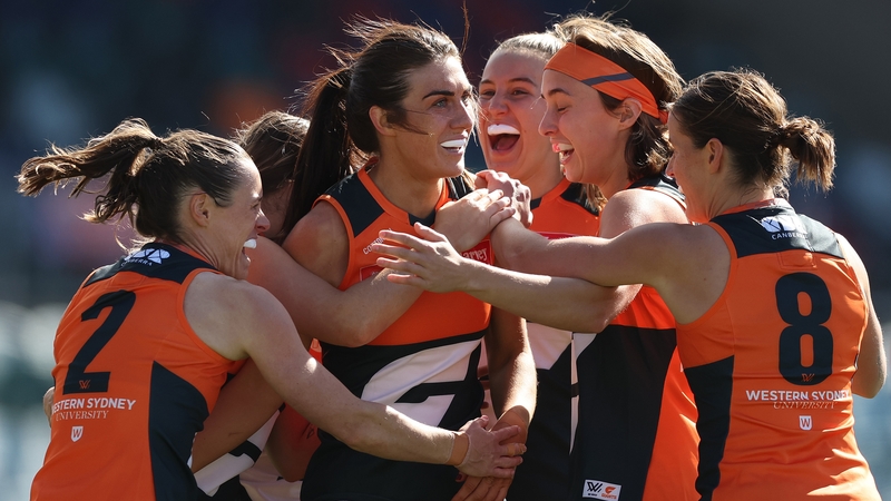 Eilish O'Dowd (C) is mobbed after her memorable goal