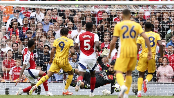 Joao Pedro (No 9) slots home the equaliser for Brighton