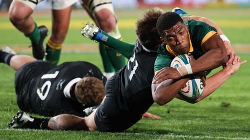 Grant Williams dives over for the winning try
