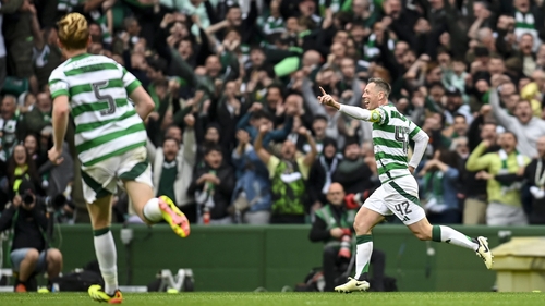 Callum McGregor celebrates the third goal