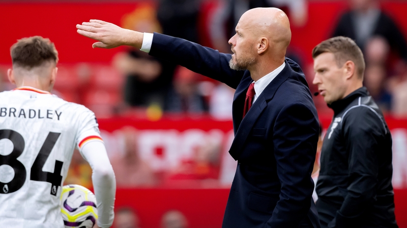 Erik ten Hag directs his troops during the loss to Liverpool