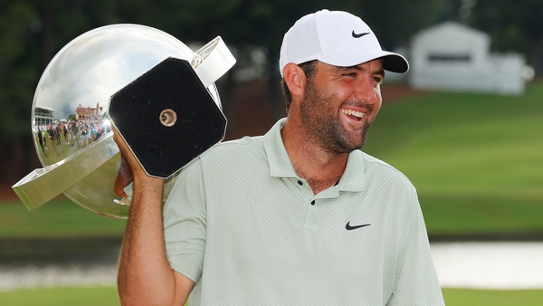 Scottie Scheffler with the FedEx Cup after his win at East Lake