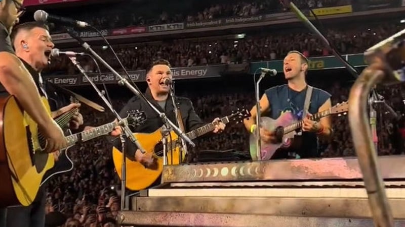 Aslan on stage with Coldplay at Croke Park