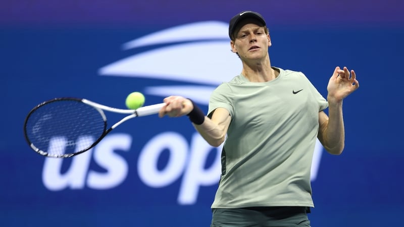 Jannik Sinner plays a forehand in his win over Tommy Paul