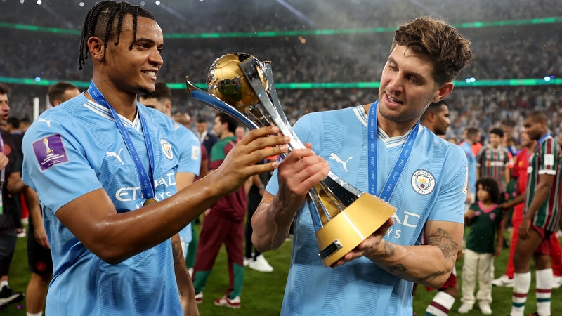 Manuel Akanji and John Stones of Manchester City celebrate with the FIFA Club World Cup last December
