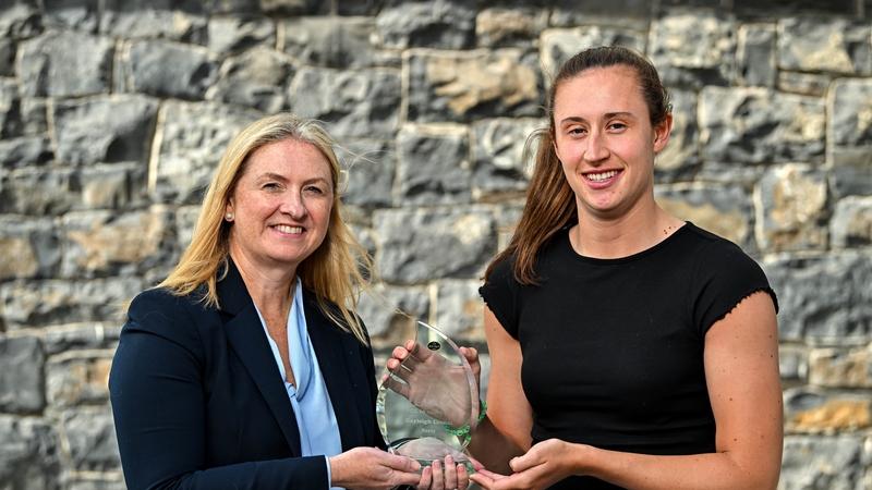 Kerry's Kayleigh Cronin (r) receiving her prize from sponsors