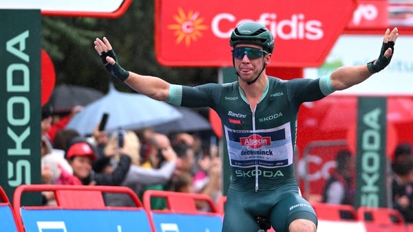 Kaden Groves sports the Green Points Jersey as he celebrates at finish line