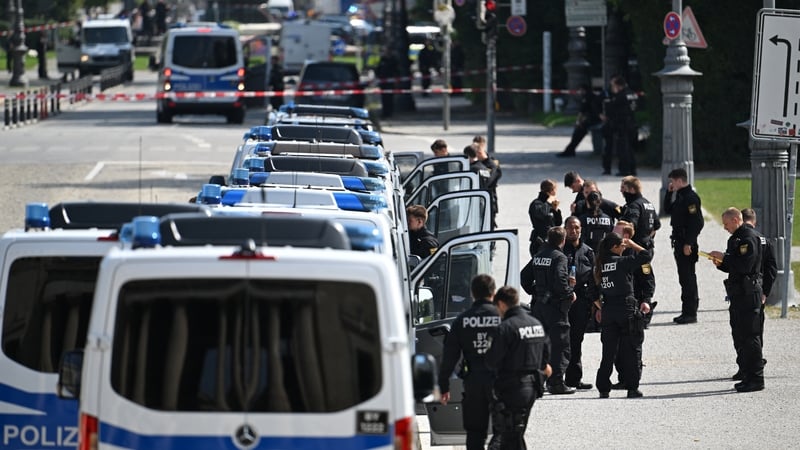 Police officers secure the area after a shooting near the building of the Documentation Centre for the History of National Socialism in Munich