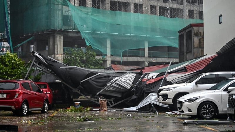 Cars are covered in debris after Super Typhoon Yagi hit Hai Phong