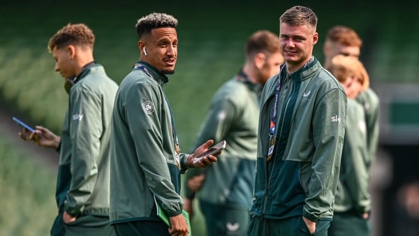 Callum Robinson and Evan Ferguson walk the pitch ahead of this evening's game