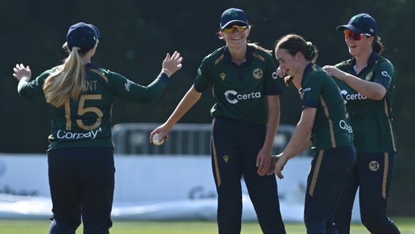Alice Rector celebrates catching England's Hollie Armitage