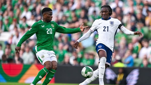 Chiedozie Ogbene (L) in action against Eberechi Eze