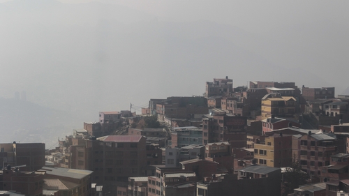 A large blanket of smoke from the forest fires envelops the city of La Paz, Bolivia