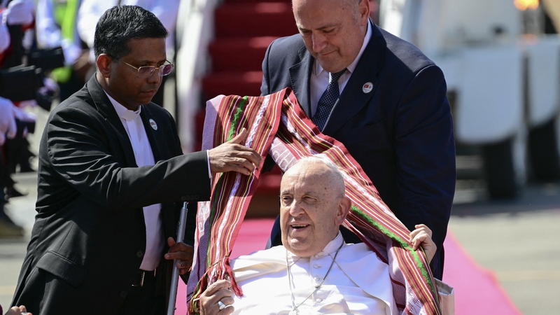 Pope Francis is greeted upon his arrival at Presidente Nicolau Lobato International Airport in East Timor