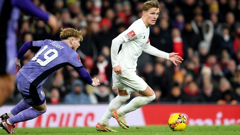 Arsenal's Martin Odegaard (R) and Liverpool's Harvey Elliott are both facing injury lay-offs