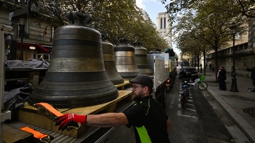 The bells were transported through the city to Notre Dame