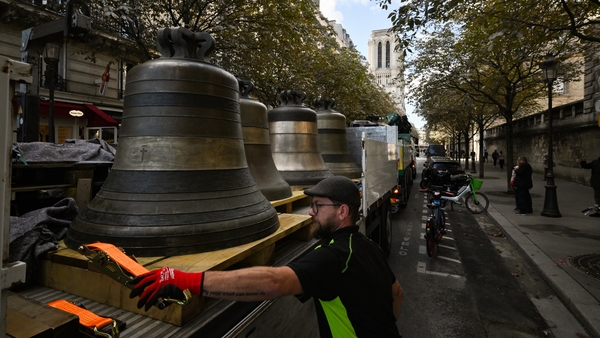 The bells were transported through the city to Notre Dame