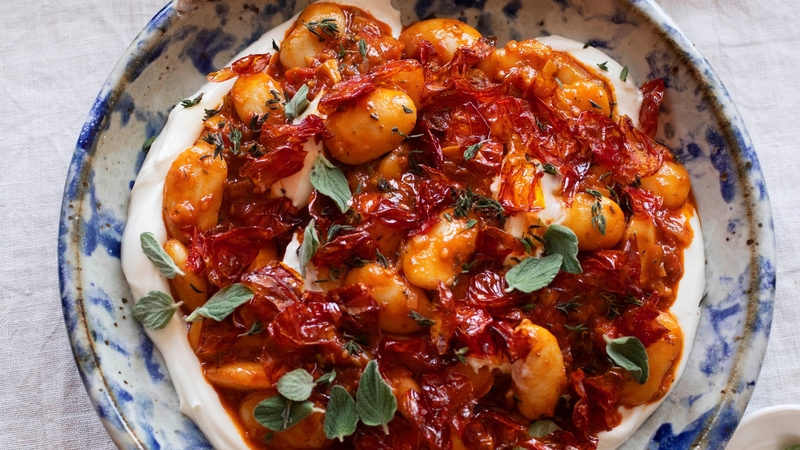 Butter beans with roasted cherry tomatoes from Ottolenghi COMFORT (Jonathan Lovekin/PA)