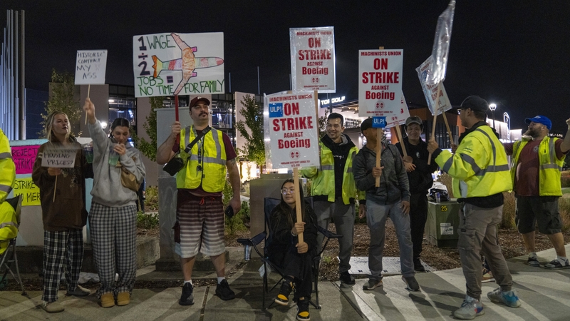 Striking workers started to gather outside the entrances of Boeing factories in the Seattle area