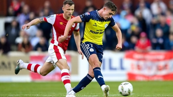 Evan Caffrey of Shelbourne in action against St Pat's Jamie Lennon back in May