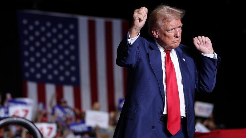 Donald Trump greets supporters during a campaign rally at The Expo at World Market Center Las Vegas