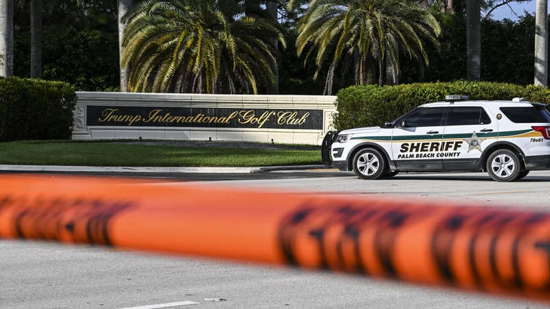 Officials said the gunman was in some bushes near the property line of Donald Trump's golf course