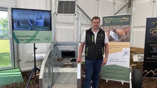 Kieran Supple, Reap Interactive, standing beside his performance monitoring station, BovinePlus