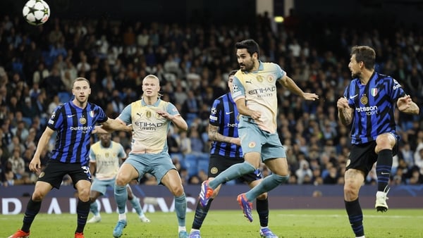 Gundogan heads straight at the keeper