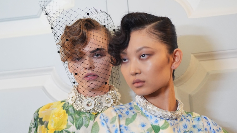 Models walking for Richard Quinn sported slicked back buns with a twist at London Fashion Week (Yui Mok/PA)