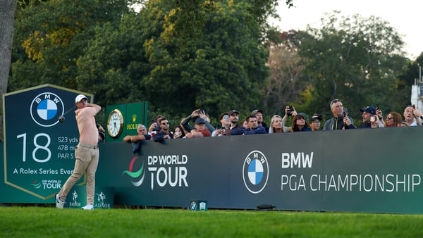 Rory McIlroy tees off on the 18th hole