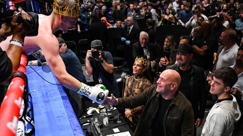 Callum Walsh and UFC president Dana White share a moment after the Cork fighter was figuratively and literally crowned the winner of his fight against Przemyslaw Runowski at the 3 Arena