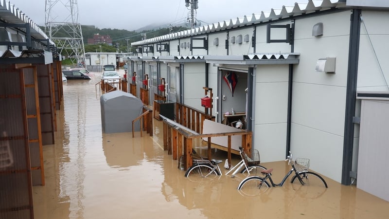 Landslides blocked roads and widespread flooding affected homes