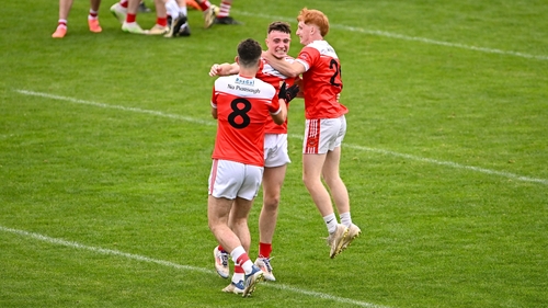 Pádraig Pearses' Sean Canning, centre, celebrates with team-mates Conor Ryan, 8, and Jack Nevin after victory over St Brigid's