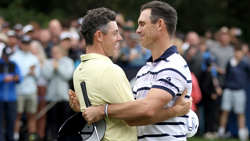 Rory McIlroy and Billy Horschel embrace after the deciding hole