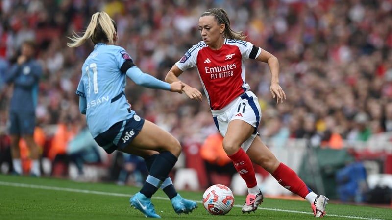 Arsenal's Katie McCabe takes on Manchester City's Lauren Hemp at Emirates Stadium