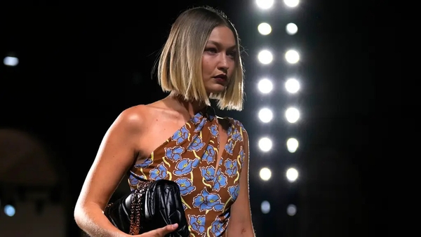 Fresh florals and pastels were a new direction for Versace, modelled on the catwalk by Gigi Hadid (Antonio Calanni/AP)