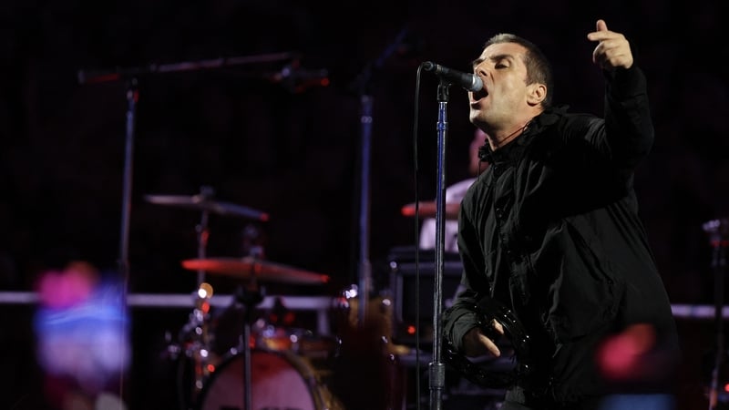 Liam Gallagher says people who criticised his performance at Wembley Stadium were "imposters"
