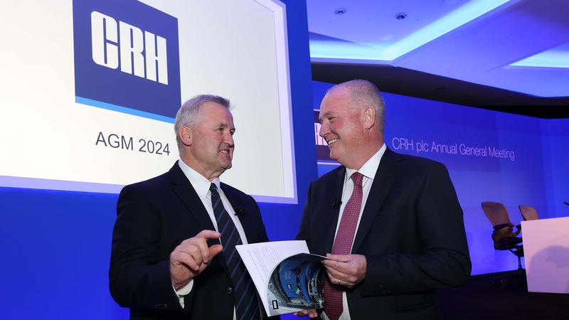 Outgoing CRH CEO Albert Manifold (left) and its incoming CEO Jim Mintern at the company's AGM recently