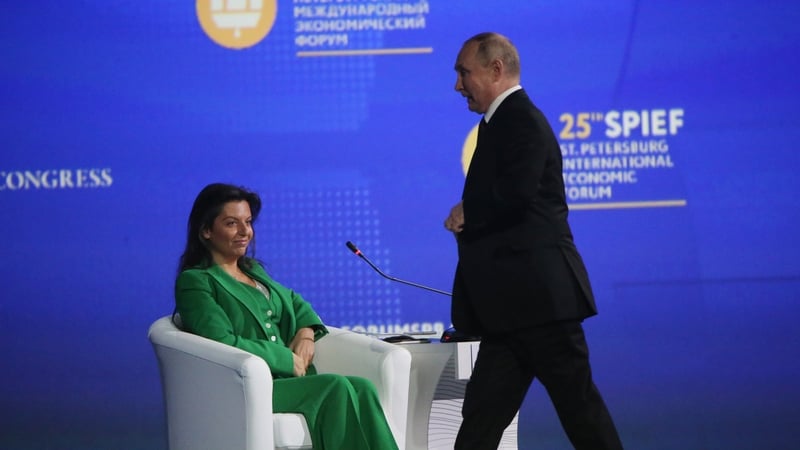 Russian President Vladimir Putin (R) and RT television company Editor-in-Chief Margarita Simonyan (L) during the Saint Petersburg Economic Forum SPIEF 2022, June,17,2022, in Saint Petersburg, Russia. Photo: Getty Images