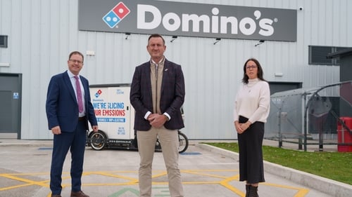 Minister of State James Lawless, Andrew Rennie, CEO of Domino's Pizza Group and Annelie McCaffrey, Managing Director of Domino's Ireland at its new centre in Naas