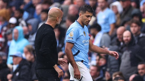 Rodri (R) was named in the Premier League 2023/24 team of the season and was player of the tournament at Euro 2024