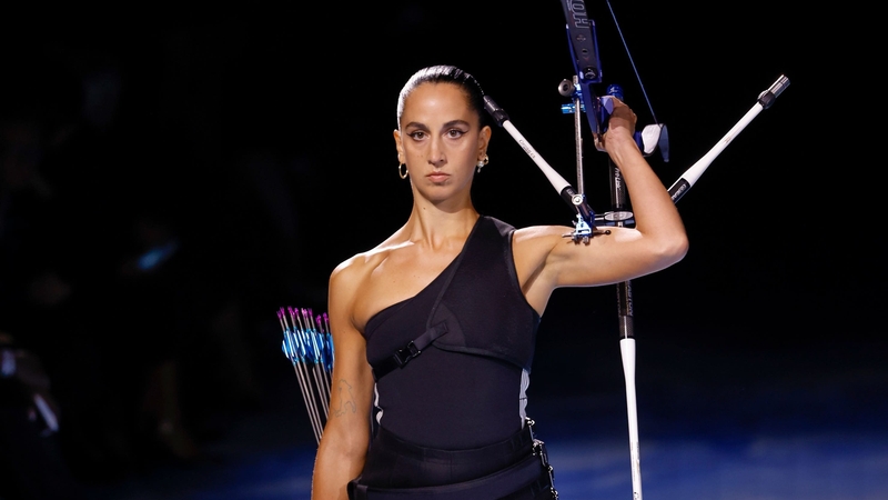 Dior showcased live archery as an homage to female strength (Vianney Le Caer/AP)