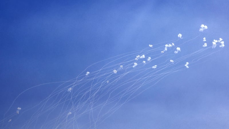 Rockets fired from southern Lebanon are intercepted by Israel's Iron Dome air defence system over the Upper Galilee region in northern Israel