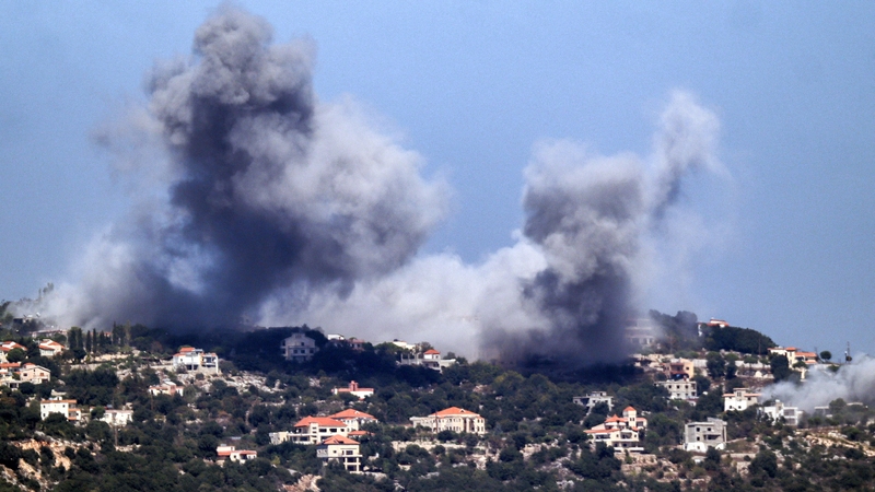 A cloud of smoke erupts during an Israeli air strike on the village of Sujud in southern Lebanon