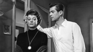 Maggie Smith and George Nader in the film Nowhere To Go, 1958