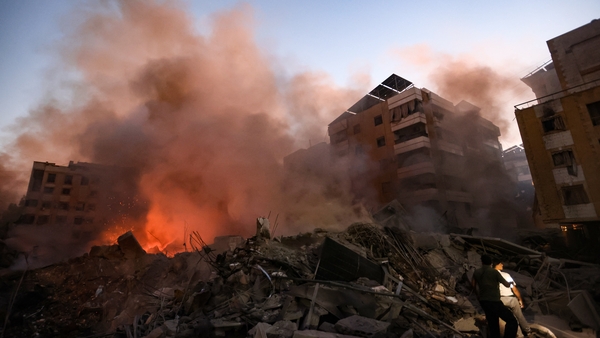 Smoke rises from the scene of an Israeli strike in Beirut on Friday