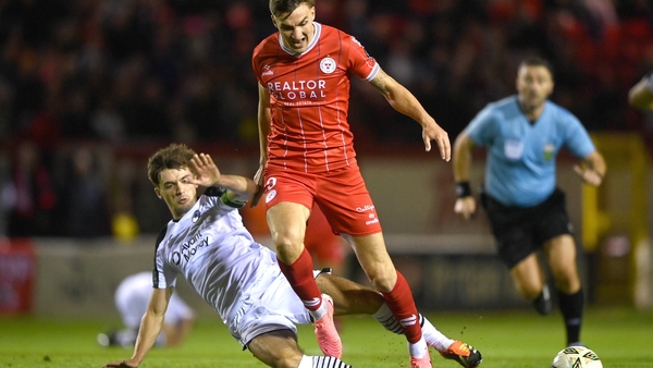 Sean Boyd is tackled by Niall Morahan of Sligo Rovers
