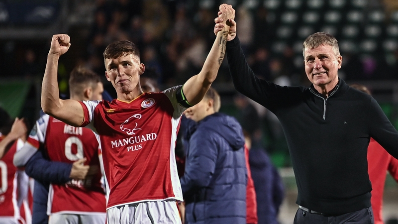 St Patrick's Athletic captain Joe Redmond celebrates with his manager Stephen Kenny