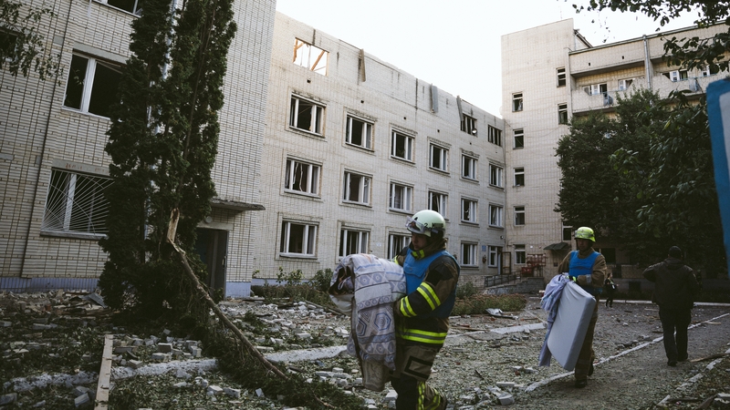 Rescue workers seen during a clean up in the Sumy region (file image)