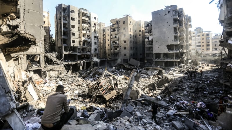 People check the rubble of buildings which were levelled by Israeli strikes that killed Hassan Nasrallah